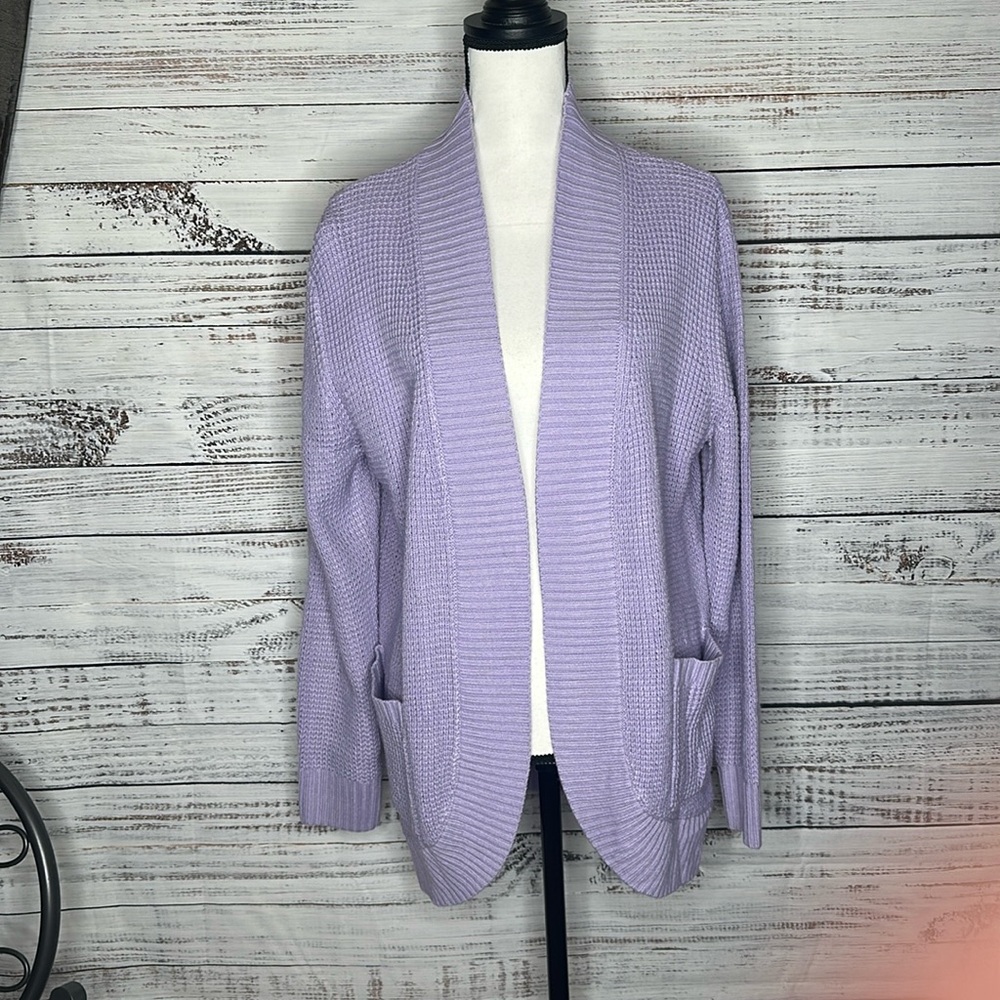 Ladies Violet Cardigan no buttons on the front.